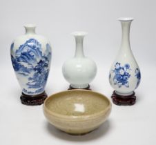 Two modern Chinese blue and white vases on stands, a crackle glaze celadon bowl and vase, tallest