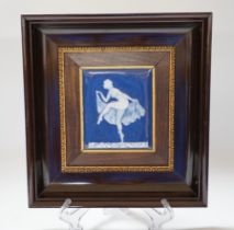 A Limoges pate sur pate plaque of a dancing girl, signed, 11cm wide x 13cm high