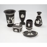 A collection of Wedgwood basalt jasperware, tallest 13.5cm