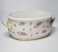 An Edwardian porcelain floral and gilt decorated foot bath, top 40cm wide not including handles