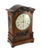 J. King of St Albans. A William IV mahogany bracket clock, in architectural case with flower and