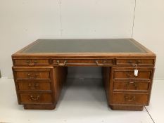 A mid century mahogany pedestal desk, width 162cm, depth 93cm, height 76cm