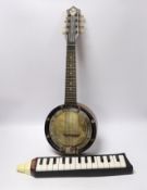 A John Grey and sons, London eight string banjolele in original case and a Hohner melodica,