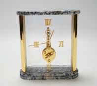 A Jaeger Le Coultre 'Mystery' clock, with gilt Roman numerals and side columns, the top and base