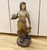 A Van Hasselt earthenware figure, signed by artist to base, 73cm