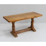 Robert Thompson, The Mouseman, a rectangular oak coffee table with adzed top on octagonal