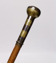 A walking cane, with engraved copper and brass handle, ‘Edmund Ivory, George King, 1741’, length