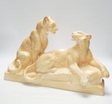 An Art Deco porcelain panther group, signed odyv, 45cm
