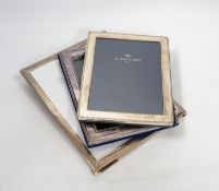 Two modern sterling silver mounted photograph frames, 21cm and a larger unmarked frame, 25cm