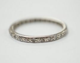 An early 20th century white metal diamond set full eternity ring, size O