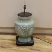 A Chinese celadon glazed lamp, 55cm high