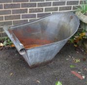 A vintage French galvanised child's bath length 84cm, width 60cm, height 54cm