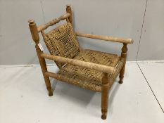 In the manner of Adrien Audoux and Frida Minet, a sisal weave beech elbow chair, width 60cm, depth