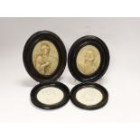 A pair of 19th century alabaster relief carved religious plaques and a pair of Sevres biscuit