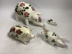 A Plichta rose decorated pig money box, 16cm, and a Plichta rose decorated hatpin holder pig, 23cm