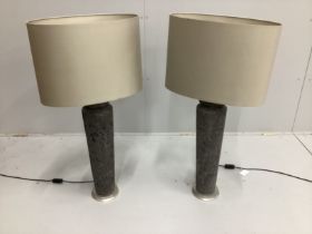A pair of contemporary faux stone table lamps and shades, height including shades 100cm.