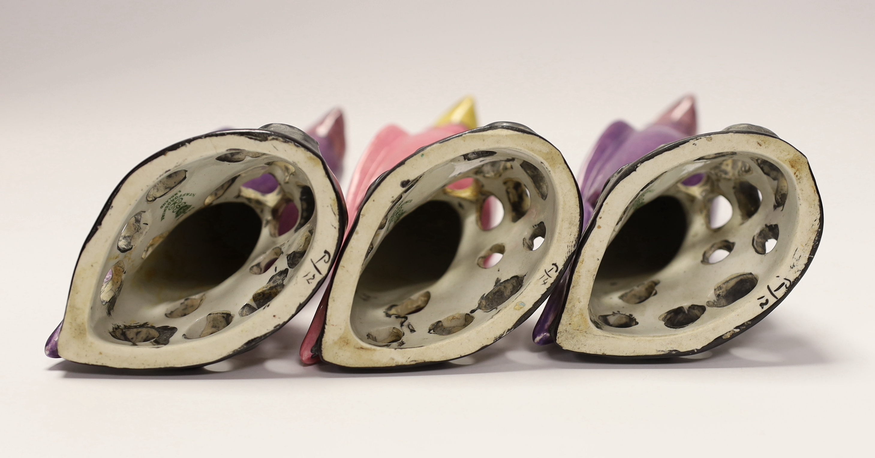 Three Staffordshire parrots with purple and pink glazed, each stamped, 19cm high - Image 4 of 4