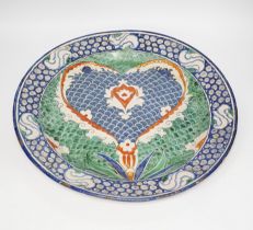 A late 19th century Italian charger in Iznik style, 45cm in diameter