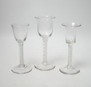 Three 18th century wine glasses with DSOT stems, two examples with bell-shaped bowls, tallest, 17cm