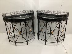 A pair of contemporary wrought iron and wirework 'D' shaped console tables with mirrored tray