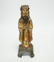 A Chinese late Ming polychrome bronze figure of an immortal, 20.5cm high