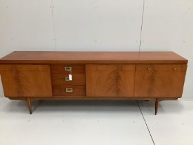 A Greaves and Thomas mid century teak sideboard, width 220cm, depth 45cm, height 76cm