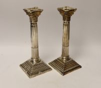 A pair of Elizabeth II silver Corinthian column candlesticks, Hampton Utilities, Birmingham, 1960,