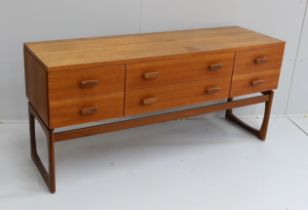 Ib Kofod Larsen for G Plan, a teak six drawer dressing table, length 152cm, depth 46cm, height