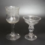 Two champagne or sweetmeat glasses c.1740, with double ogee bowls, the taller example with etched