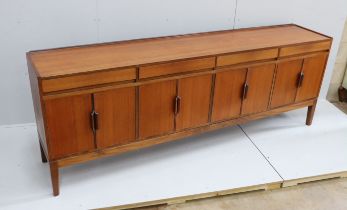 Robert Heritage for Archie Shine, a mid century teak sideboard, length 238cm, depth 46cm, height