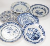 Six 18th century Chinese blue and white dishes and plates, largest 23cm diameter