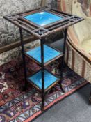 A Victorian Aesthetic movement bamboo and Minton tile inset three tier stand, width 38cm, height