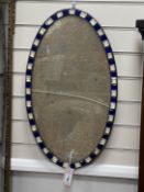An Irish style oval wall mirror, width 38cm, height 66cm
