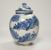 A 17th century Japanese Arita blue and white jar and cover, 22cm
