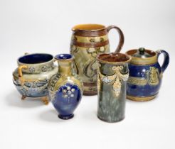 A collection of blue glazed Doulton stoneware, including vases teapots, bowl, jug and a candle