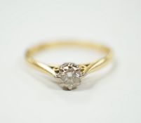 A modern 18ct gold and solitaire diamond set ring, size P/Q, gross weight 2.4 grams, the stone