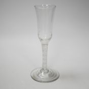 An English lead crystal ratafia glass, c.1750-60, the bowl is slightly waisted and elongated with an
