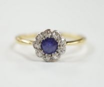 A 1920's 18ct & plat, sapphire and diamond set flower head cluster ring, size O/P, gross weight 2