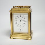 A French hour repeating brass gorge cased carriage clock with alarm, 15cm