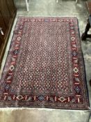 A North West Persian blue ground rug, 206 x 140cm