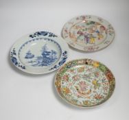 Two 18th century Chinese export plates and a 19th century Canton plate, largest 23cm