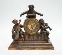 A bronzed 'musicians' mantel timepiece, 17cm