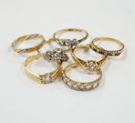 A 1920's 18ct gold and claw set solitaire diamond ring, size O, five other assorted 18ct gold and