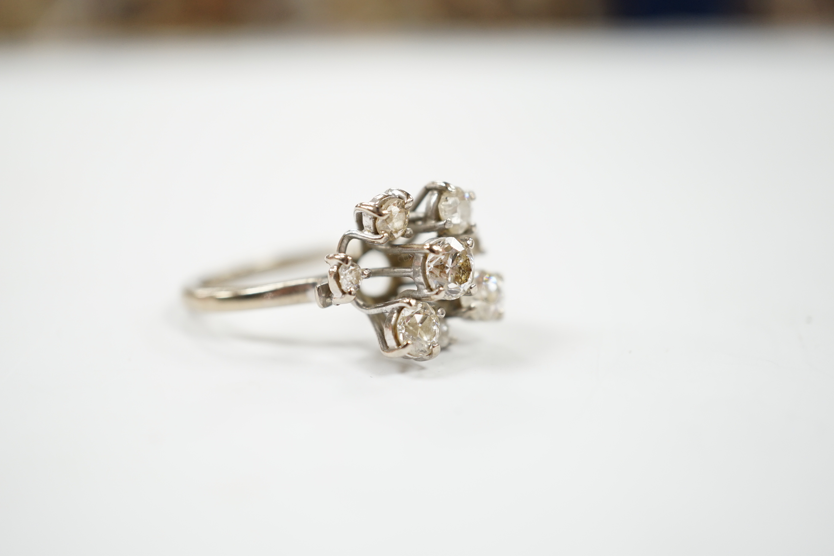 A modern 18ct white gold and graduated eight stone diamond cluster set dress ring, size S, gross - Image 3 of 4