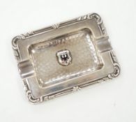 A continental white metal and 'Dortmund' enamel small rectangular dish, stamped Amiko? 900, 81mm.