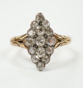 An 18ct and diamond set marquise cluster shaped ring, size N/O, gross weight 4 grams.