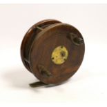 A David Slater patent 5 inch Starback centre pin fishing reel, brass mounted walnut with twin horn