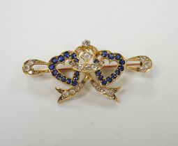 A yellow metal, sapphire and diamond set twin hearts bar brooch, 41mm, gross weight 4.8 grams.