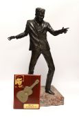 A bronze statue of Billy Fury, one of five cast by Tom Murphy, based on the public statue at the