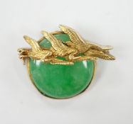 A Chinese? yellow metal mounted jade brooch, the mount with three birds, 29mm, gross weight 7.6